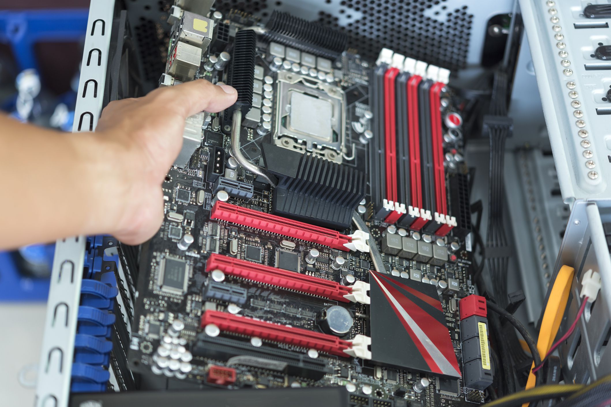 motherboard being installed GettyImages 858ba89f960546a2ae8282ea4e0b60a4