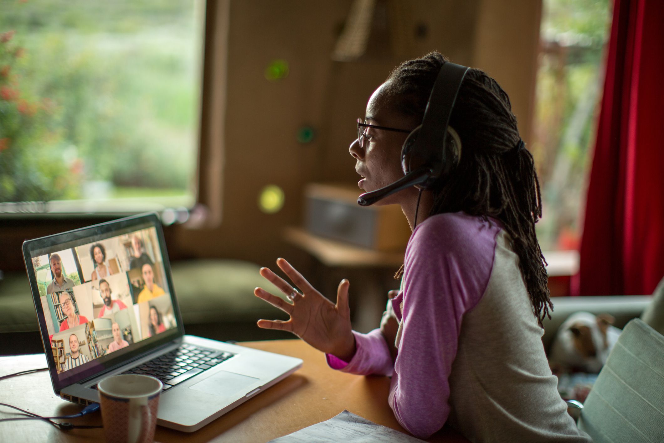 afro caribbean woman working from home during the covid lockdown 1253792565 b0dca448c15a422fa0142b9a4eae84e0