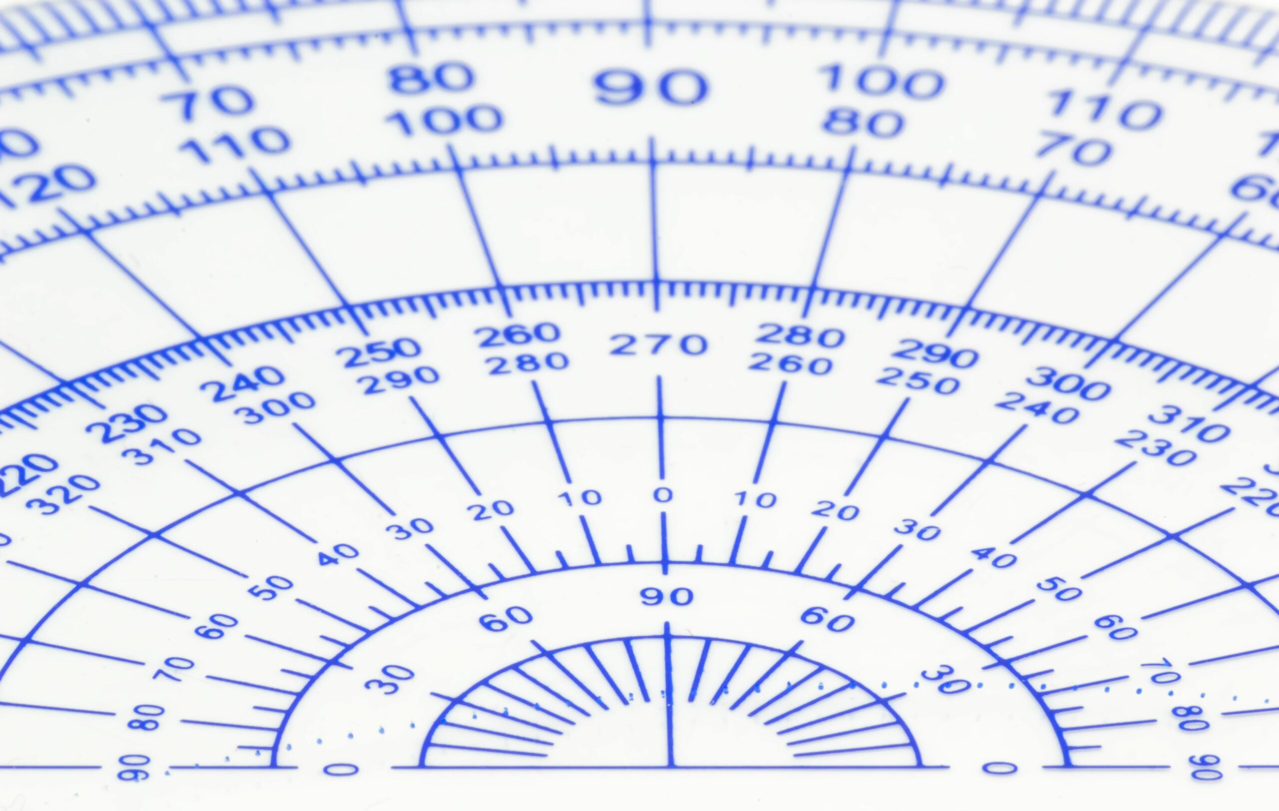 close up of protractor over white background 760304201 5be3761ec9e77c005154ac44 scaled