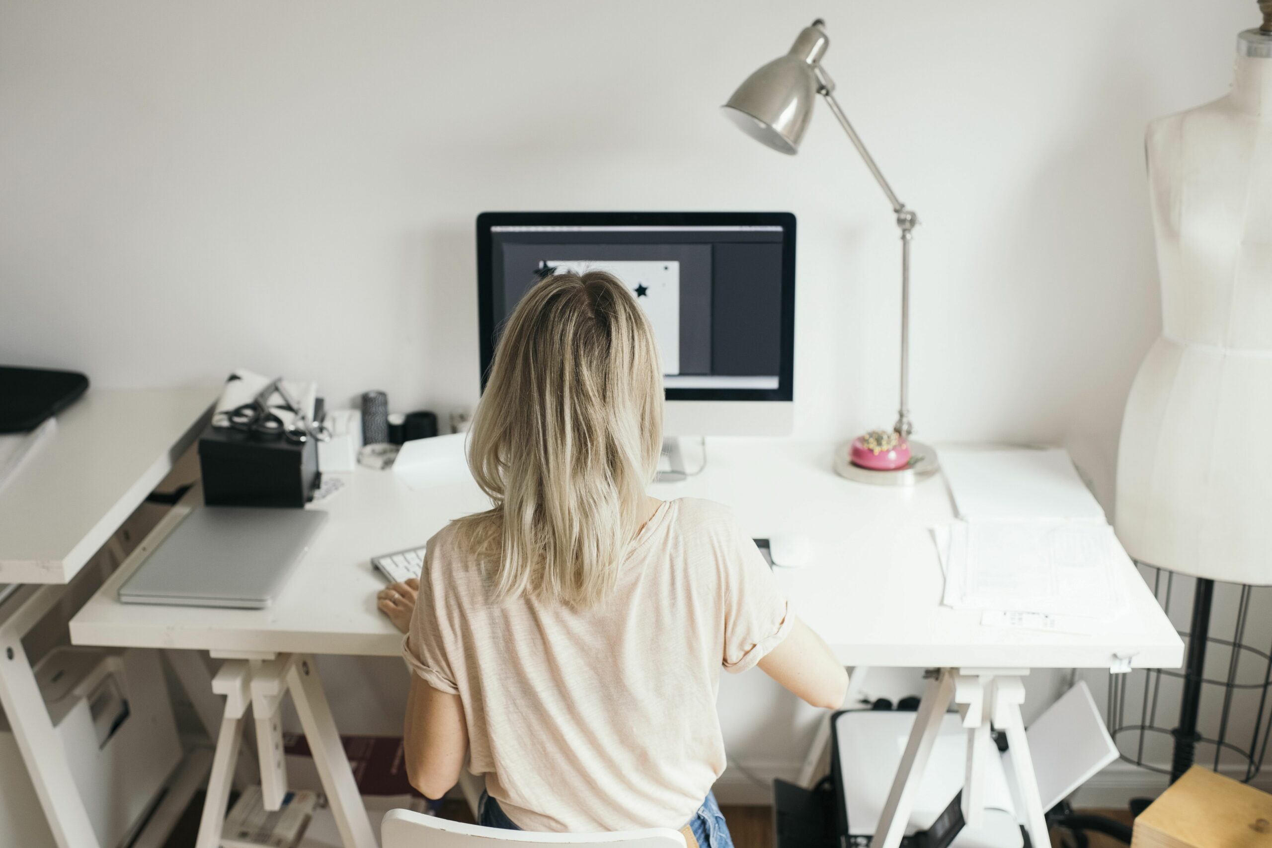 high angle view of female design professional using computer at home 734166007 5b2f996cba617700363760bf scaled