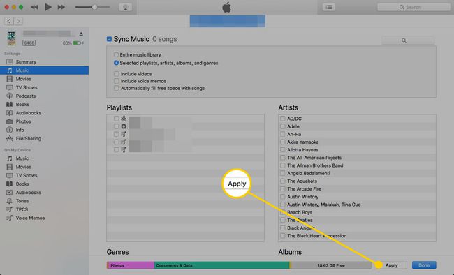 iTunesin musiikkiasetukset, joissa Käytä-painike on korostettuna