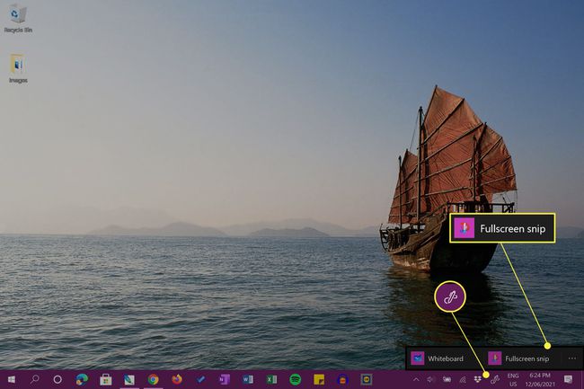 Windows 10 -työpöytä, jossa Windows Ink Workspace -valikko on avoinna tehtäväpalkissa.