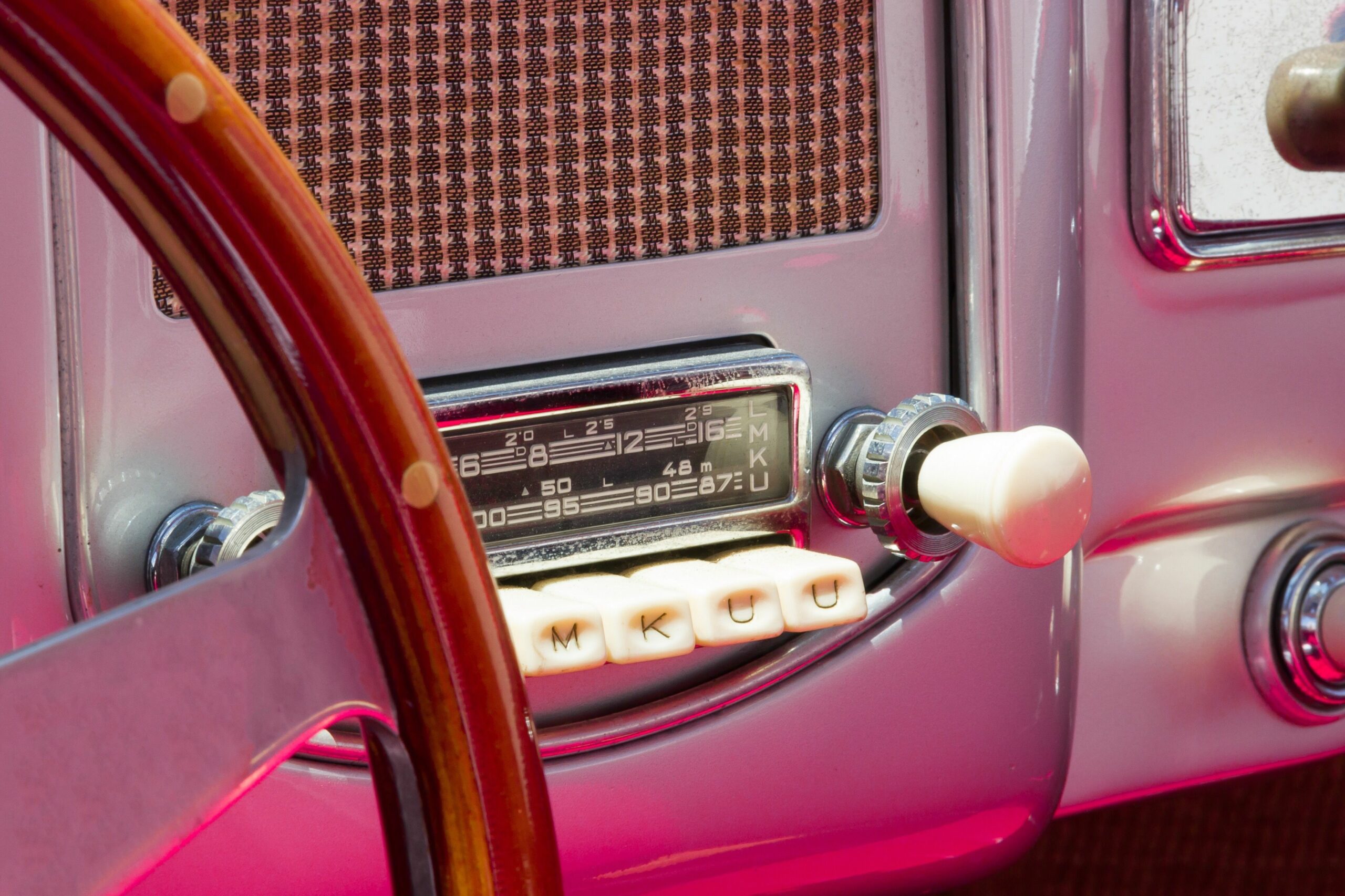 close up of radio in vintage car 748601397 5bce0856c9e77c00513af48f scaled