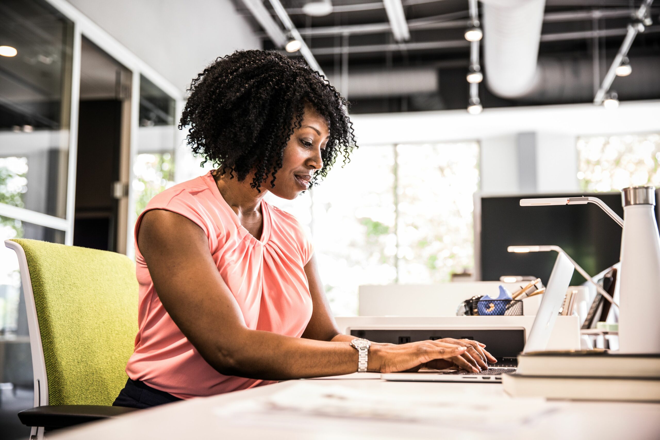 woman working in modern business office 693026992 5a39681ee258f8003650b756 scaled