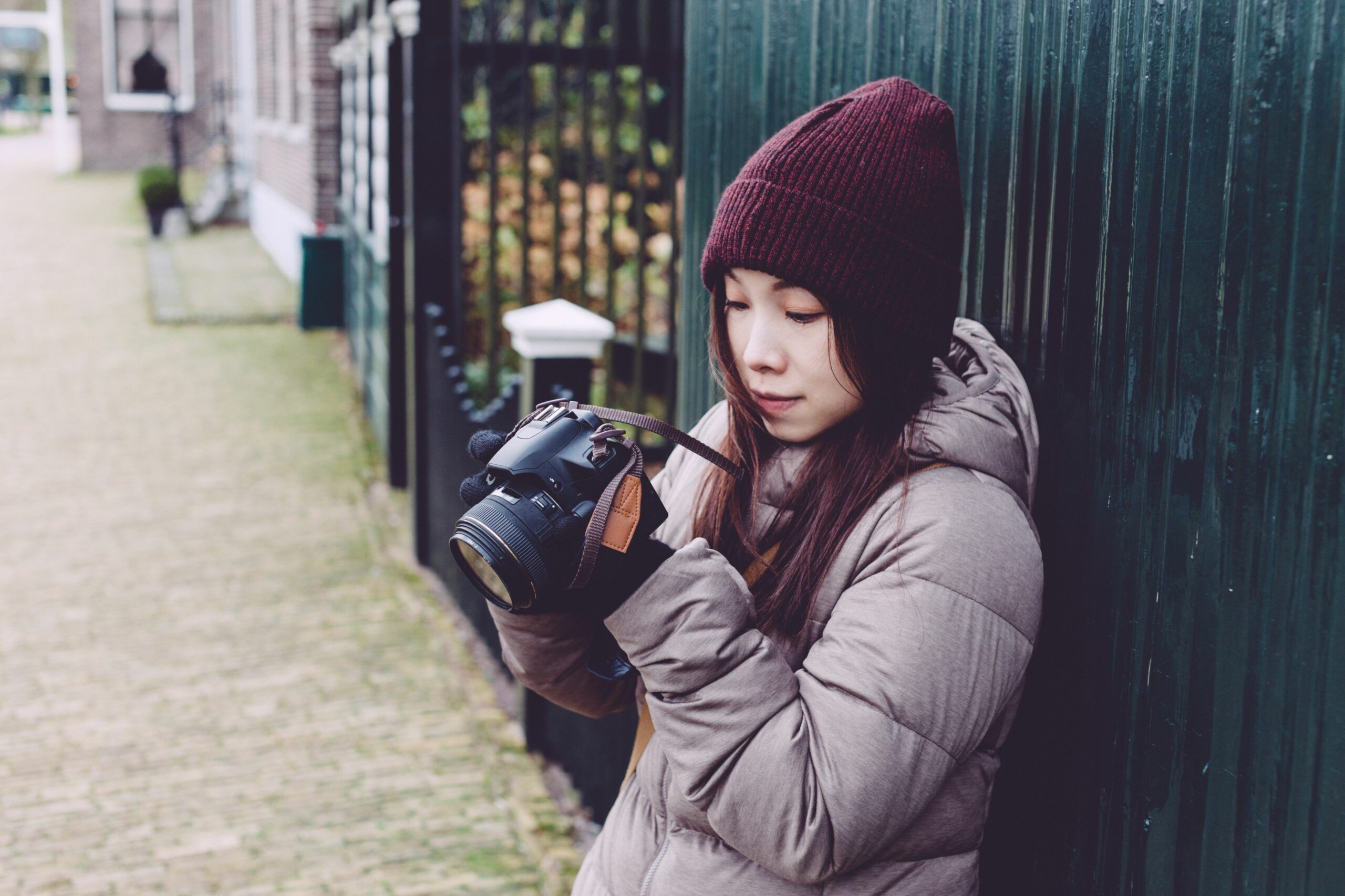 young woman taking picture on street 519800208 5b215db38023b900365492c6 scaled