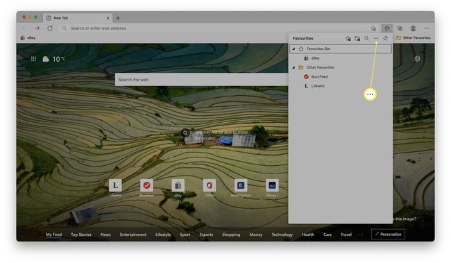 Microsoft Edge, jossa Suosikit-palkki on auki ja Lisää ellipsiä korostettuna