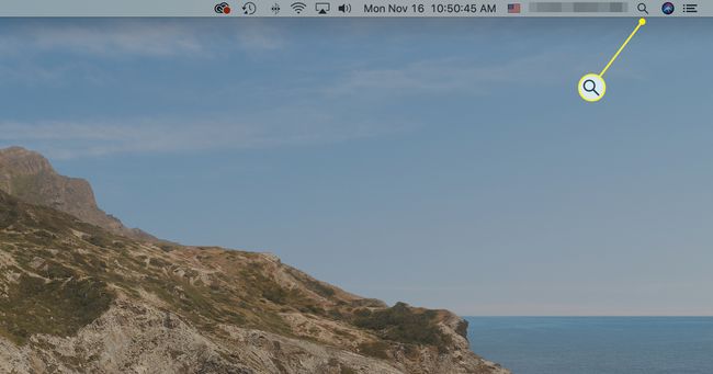 Spotlight-hakukuvake valittuna Macin valikkoriviltä