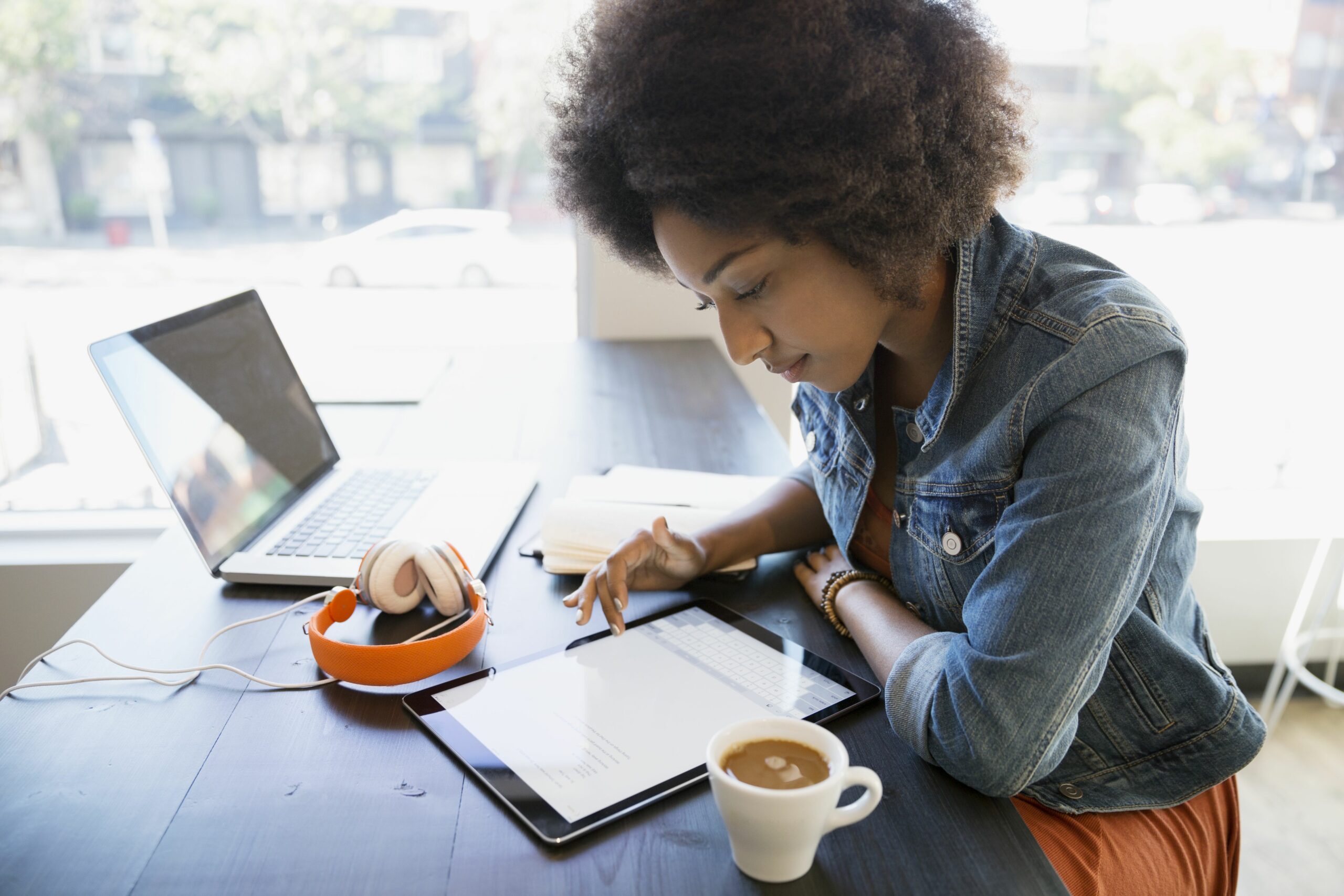 focused woman working at digital tablet in cafe 678401189 5b8ace1746e0fb0050c23c60 scaled