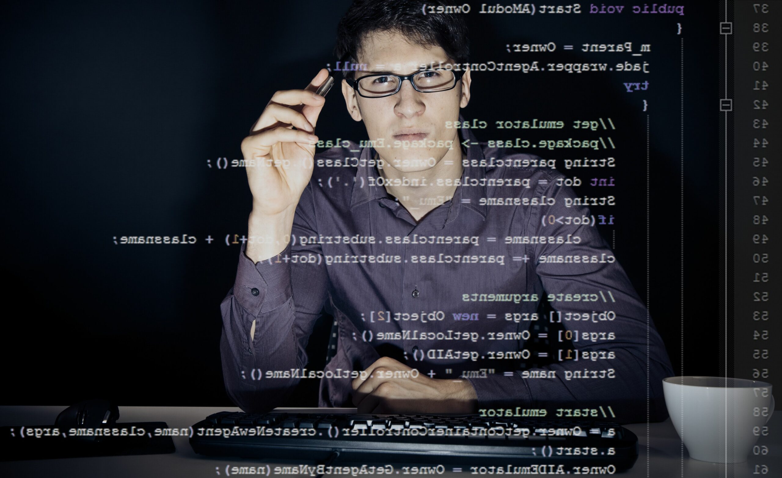 software developer using transparent computer screen at office 746096729 59a2fa80845b340011268cdd scaled