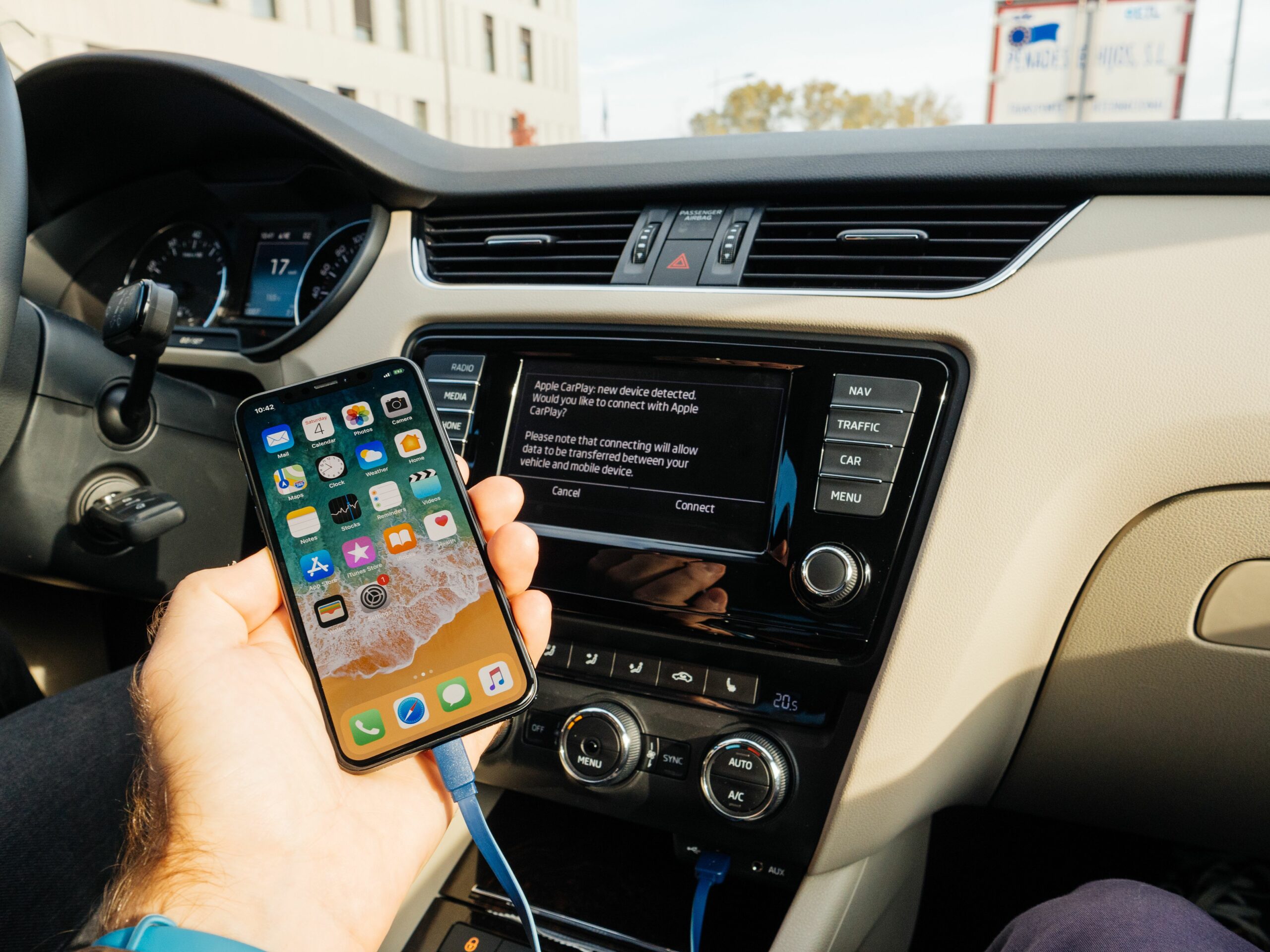 man connecting to apple carplay the new iphone x 10 by apple 881098140 5b5f538ac9e77c002c14289b scaled