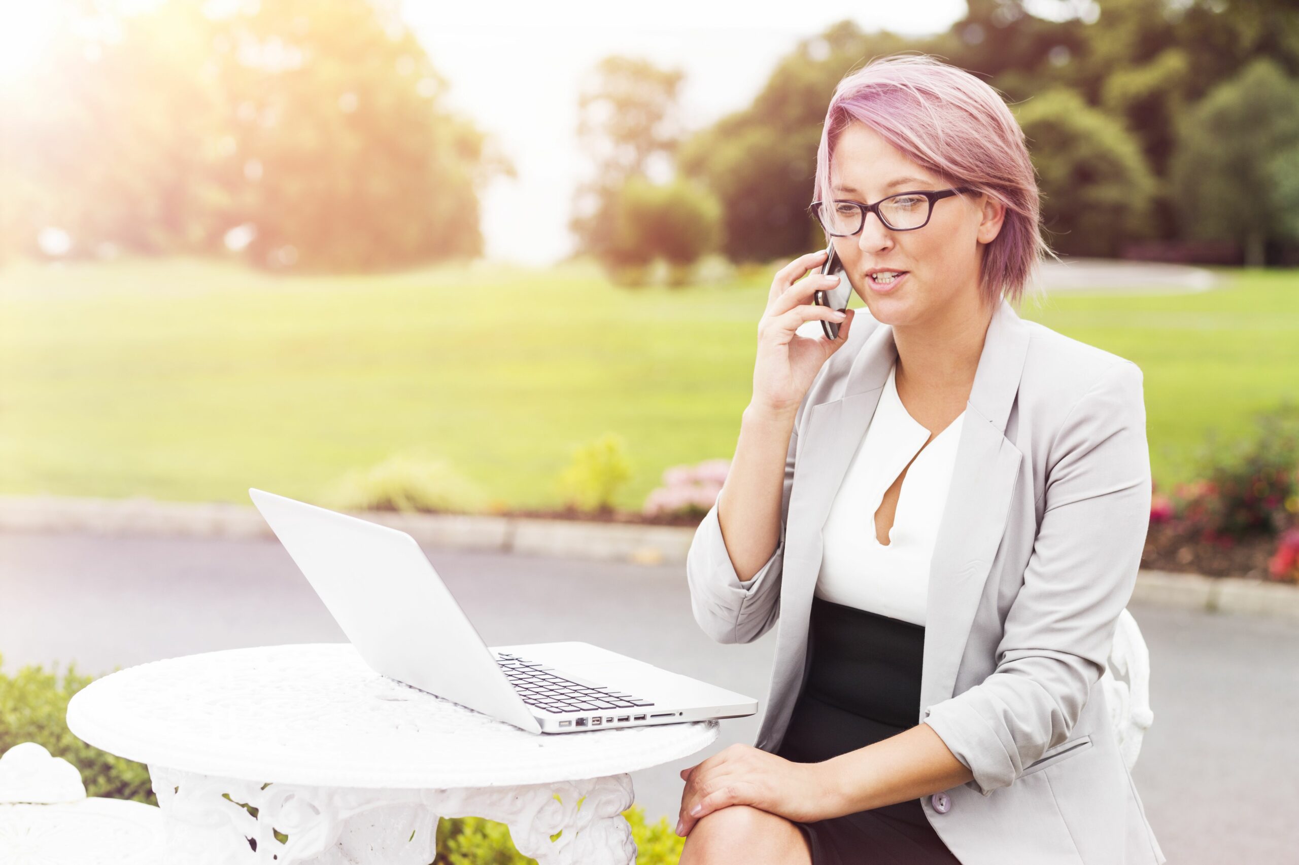 woman talking on phone outdoors 582745479 578e65535f9b584d202666ba scaled