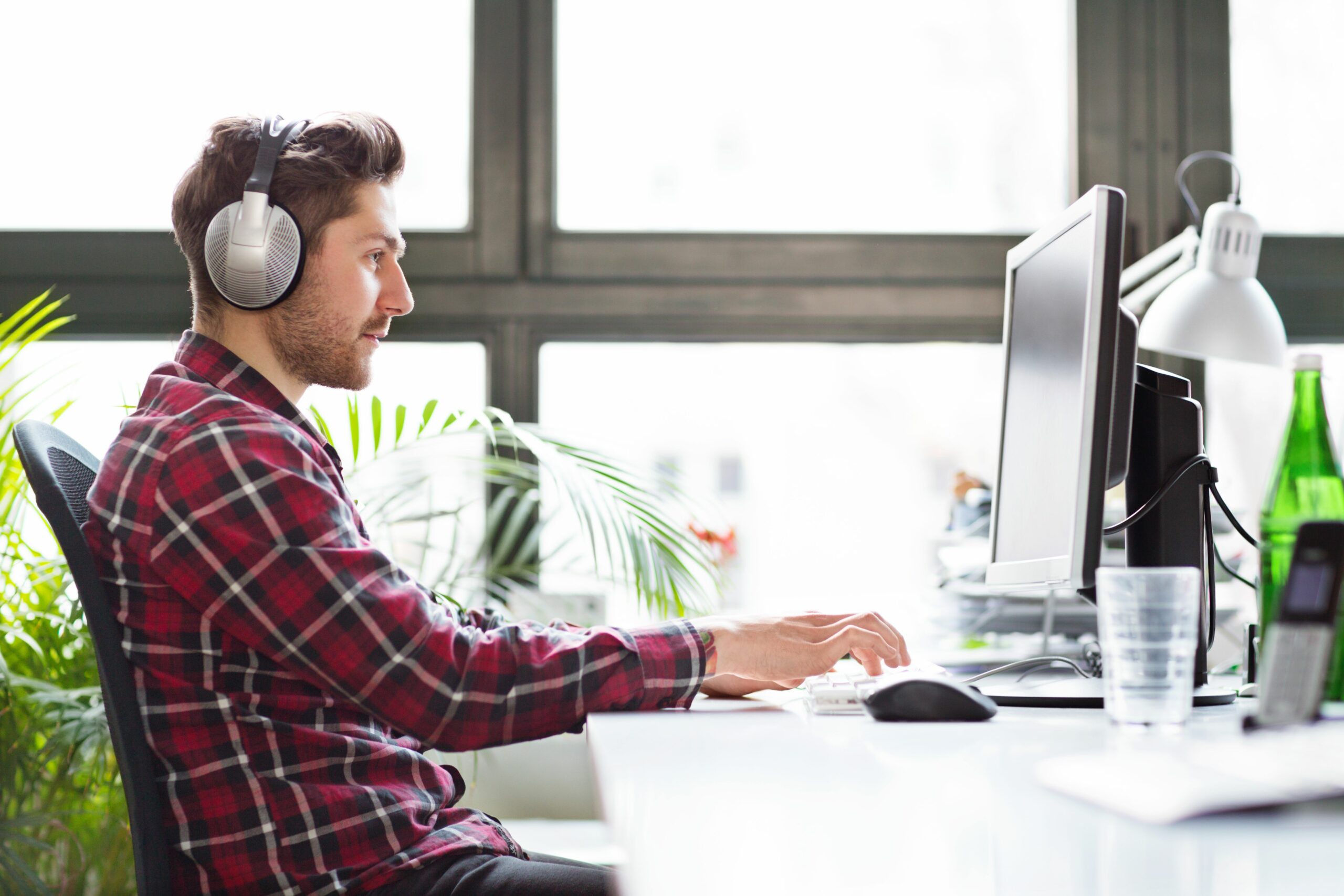 young computer programmer at a startup company 469565206 59b83bf9c412440010b644e6 scaled