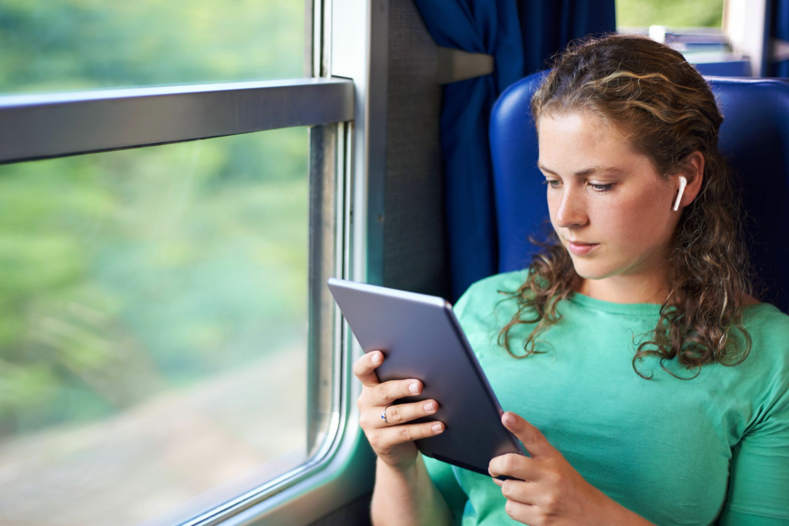 making the most of her morning commute with wireless entertainment 607916166 5b86eab746e0fb0025342a28 5c643295c9e77c000159ca9f scaled