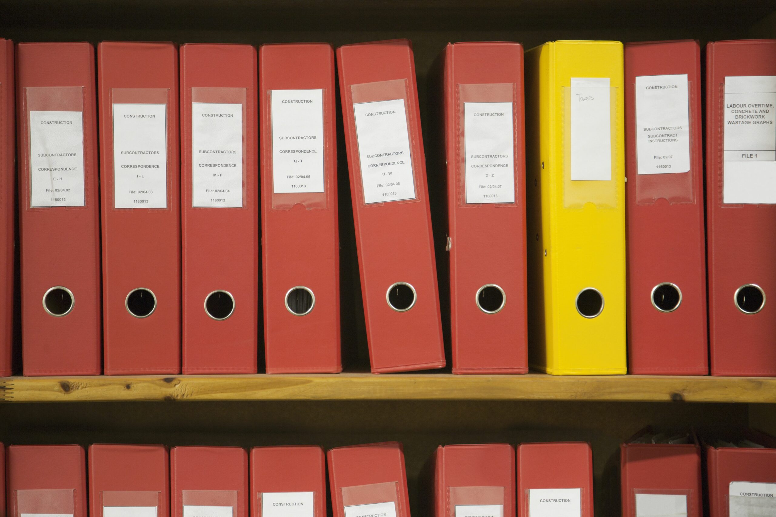 row of red work files with one yellow one 110953663 57ab2a733df78cf45974949c scaled