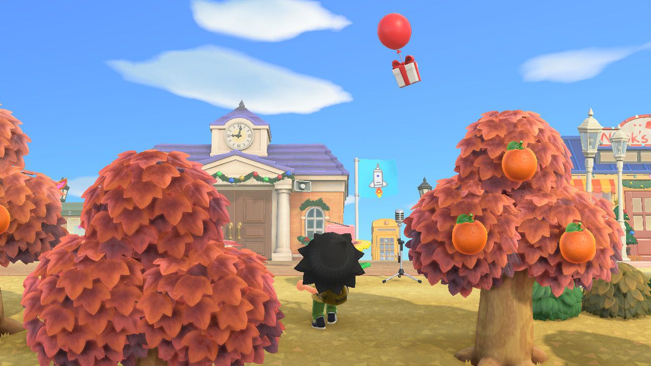 Animal Crossing -hahmo valmistautuu ampumaan ritsan kelluvaa lahjaa kohti