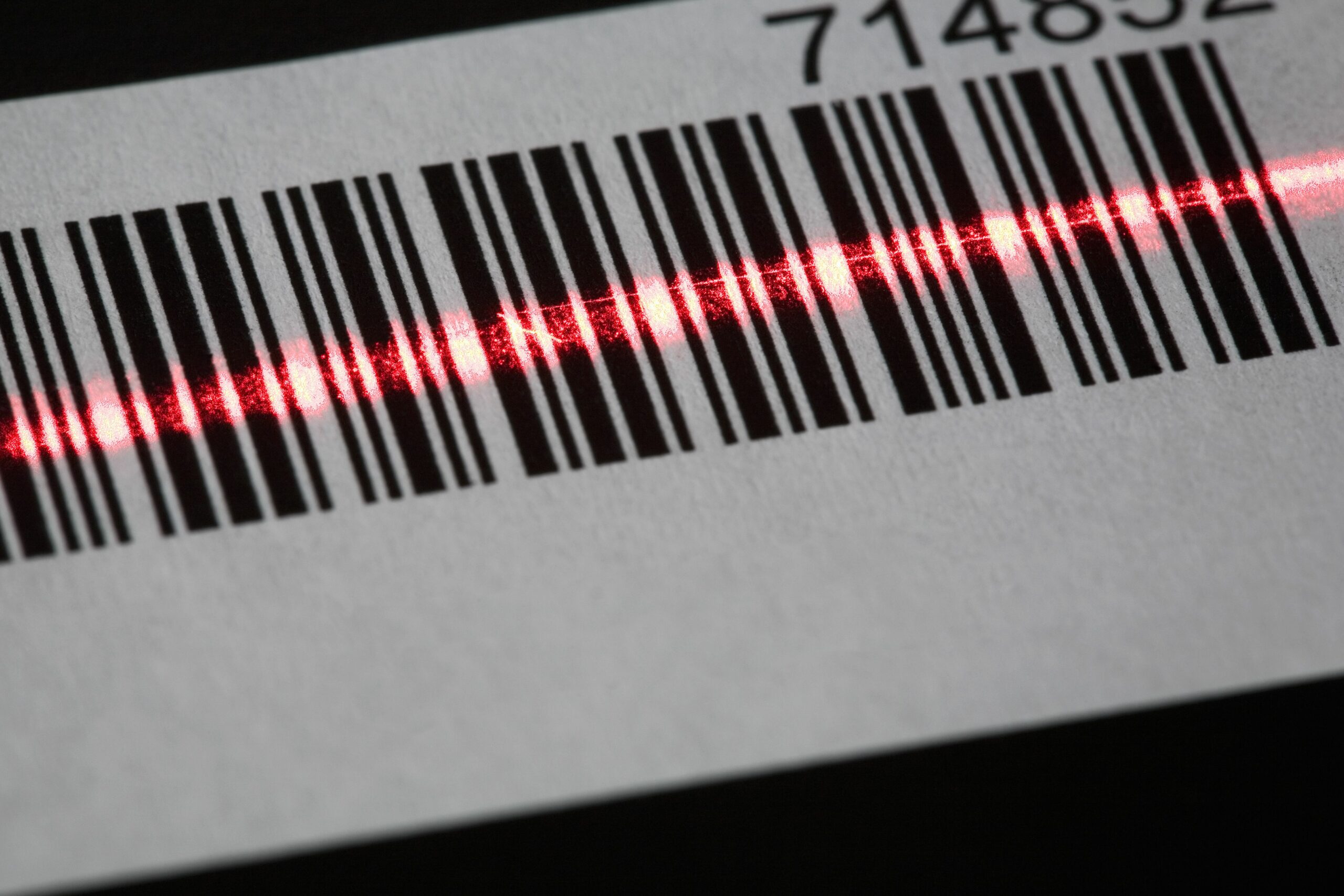 a laser reading a bar code 80567646 5c65fb5fc9e77c00017fb8d0 scaled